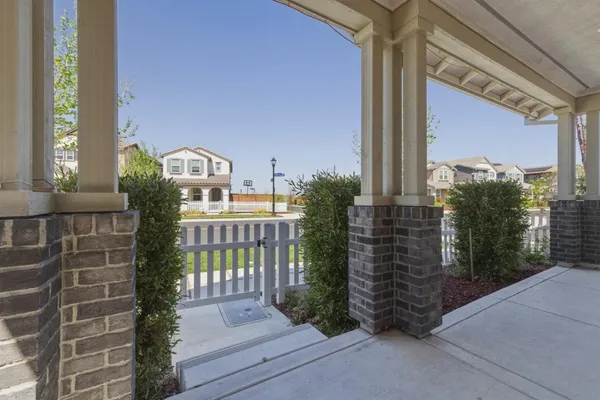 a view of a backyard with wooden floor