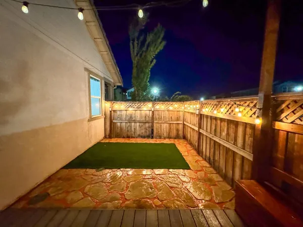 a view of balcony with wooden floor