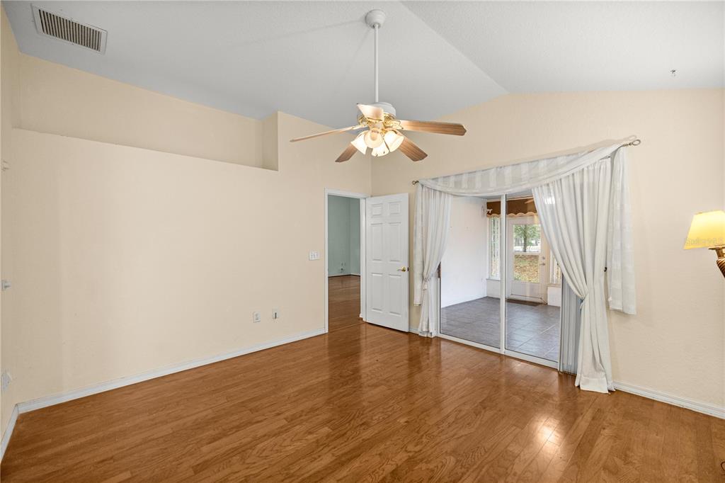 10891 Southwest 69th Circle Ocala, FL 34476 - Photo 13 of 28 a view of an empty room with a window
