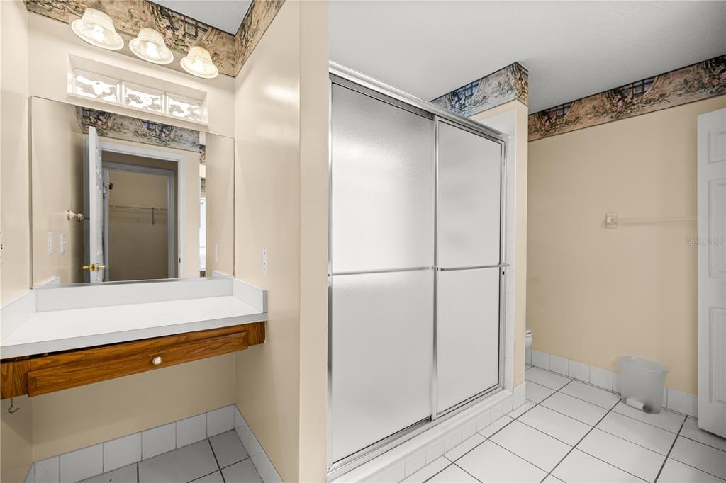 10891 Southwest 69th Circle Ocala, FL 34476 - Photo 15 of 28 a view of walk in closet with empty racks