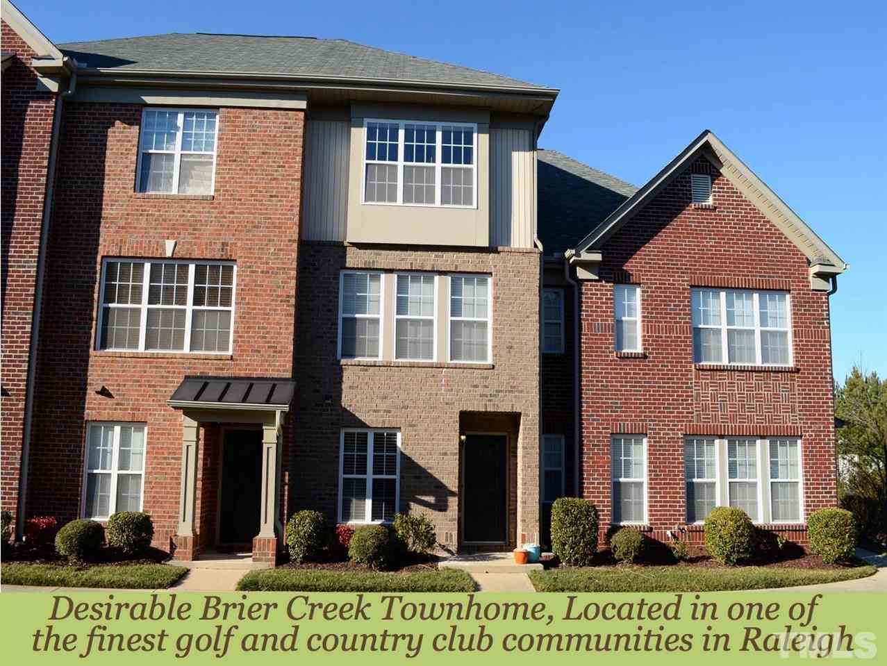 9705 Raya Court Raleigh, NC 27617 - Photo 1 of 25 a front view of a house with a yard