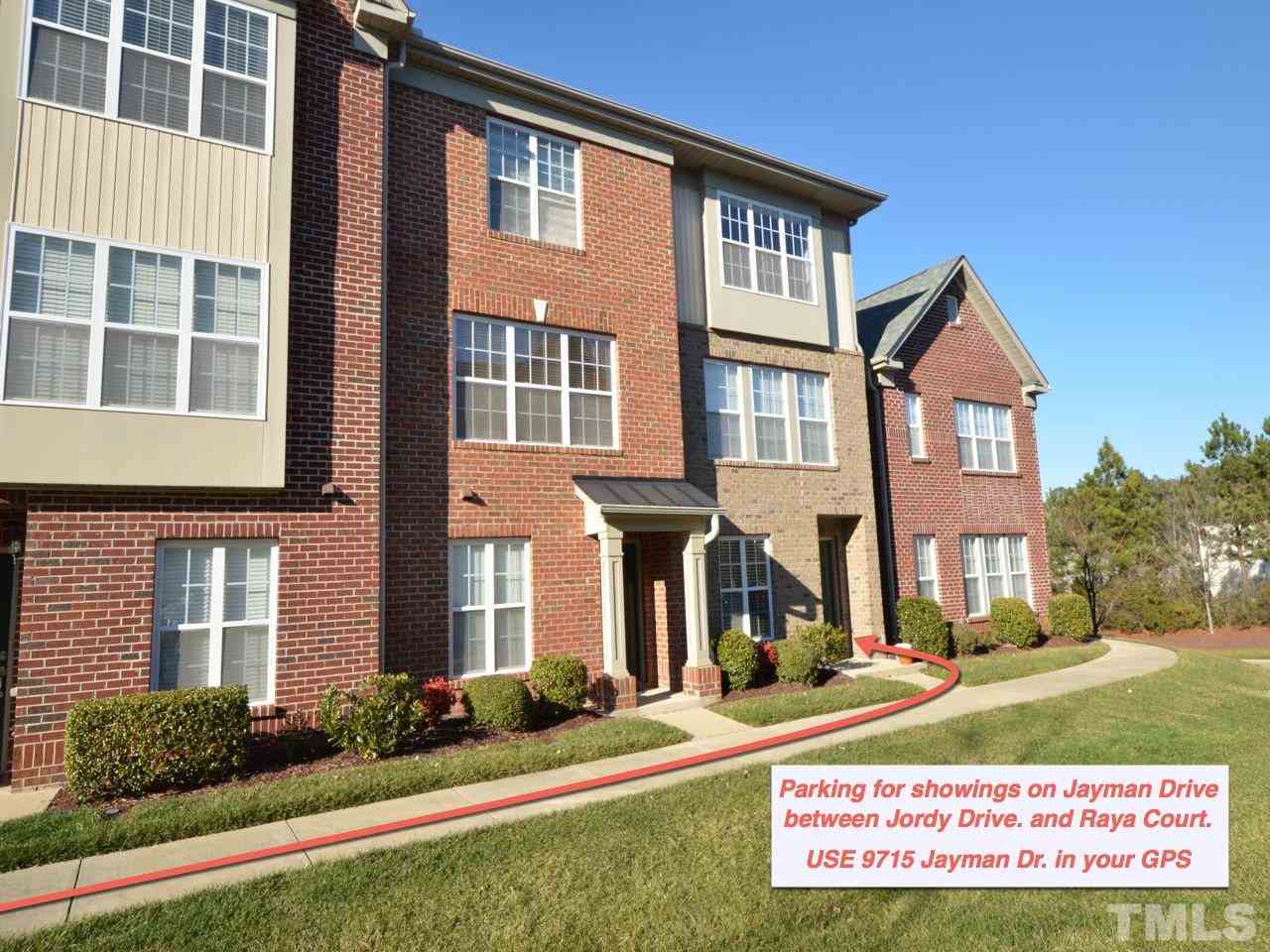 9705 Raya Court Raleigh, NC 27617 - Photo 24 of 25 a front view of a house with a yard