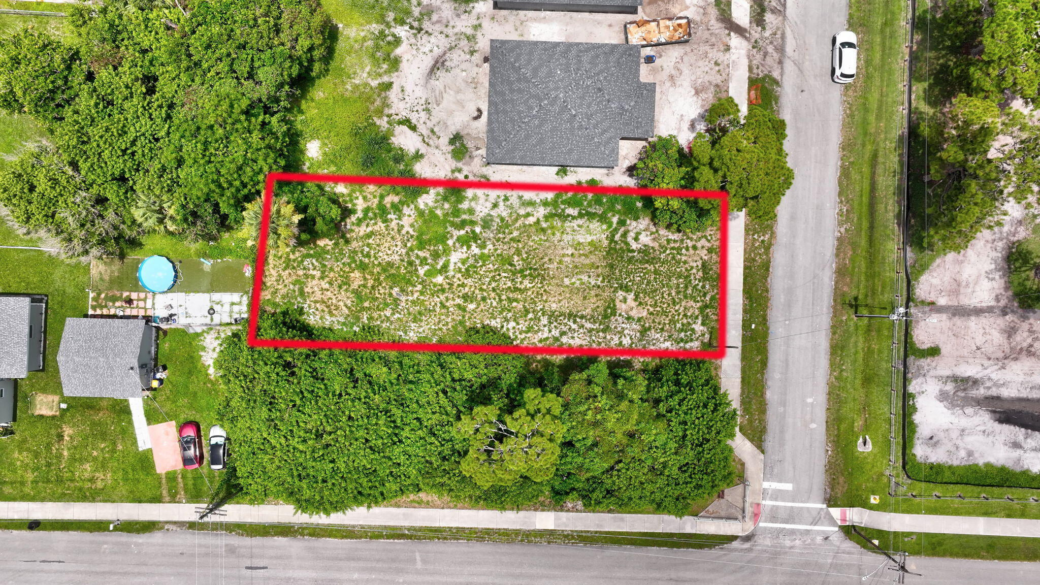 5684 Southeast 45th Avenue Stuart, FL 34997 - Photo 1 of 27 1-web-or-mls-DJI_20260620050048_0056_D_5
