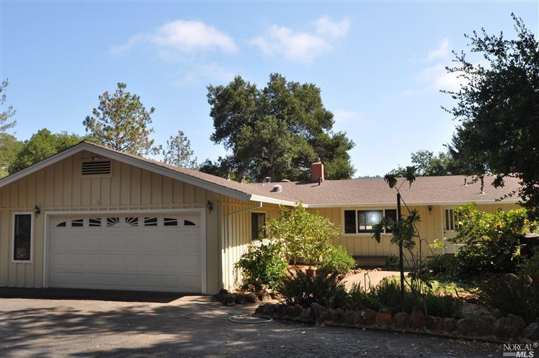 1172 Mark West Springs Road Santa Rosa, CA 95404 - Photo 1 of 1 a view of a house with a yard
