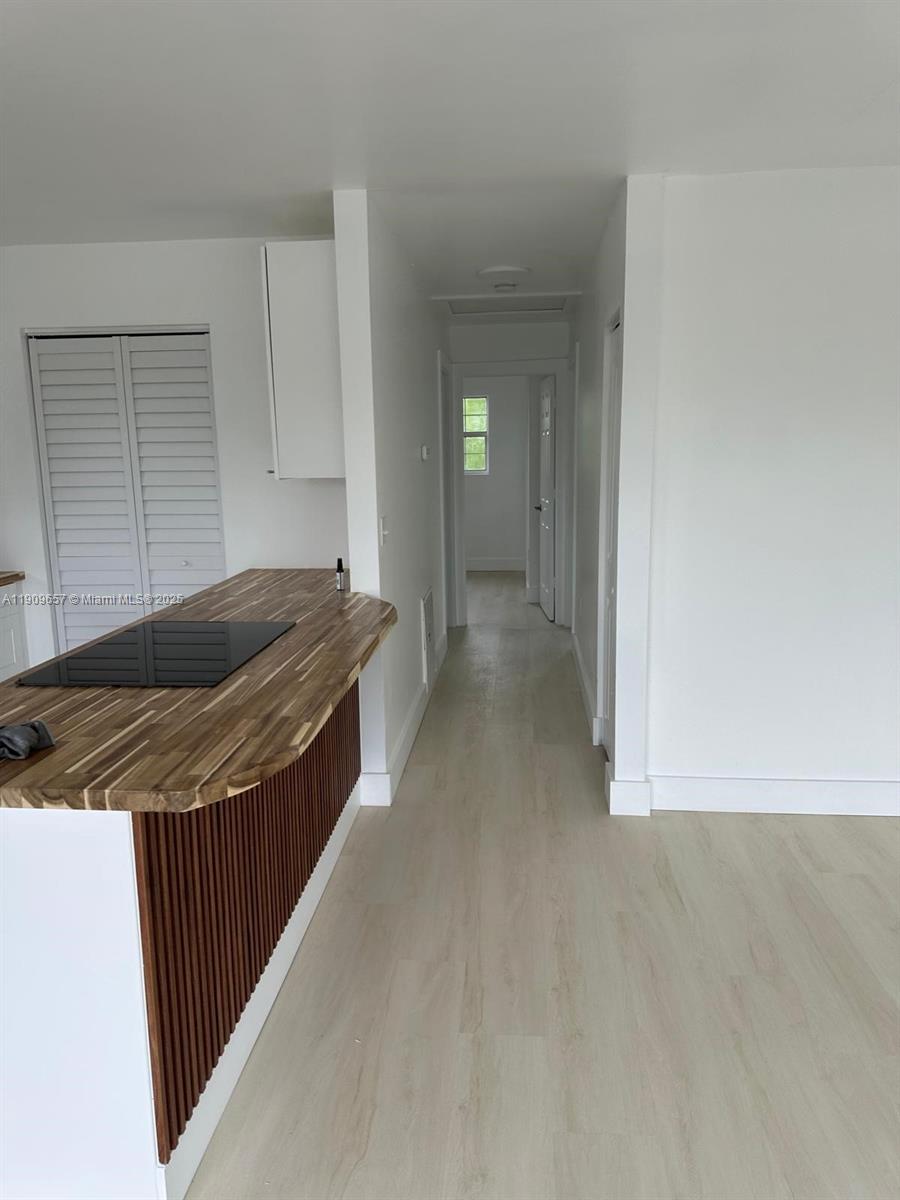 420 Burning Tree Lane, Unit 420 Punta Gorda, FL 33982 - Photo 14 of 19 a kitchen with stainless steel appliances granite countertop a sink and cabinets