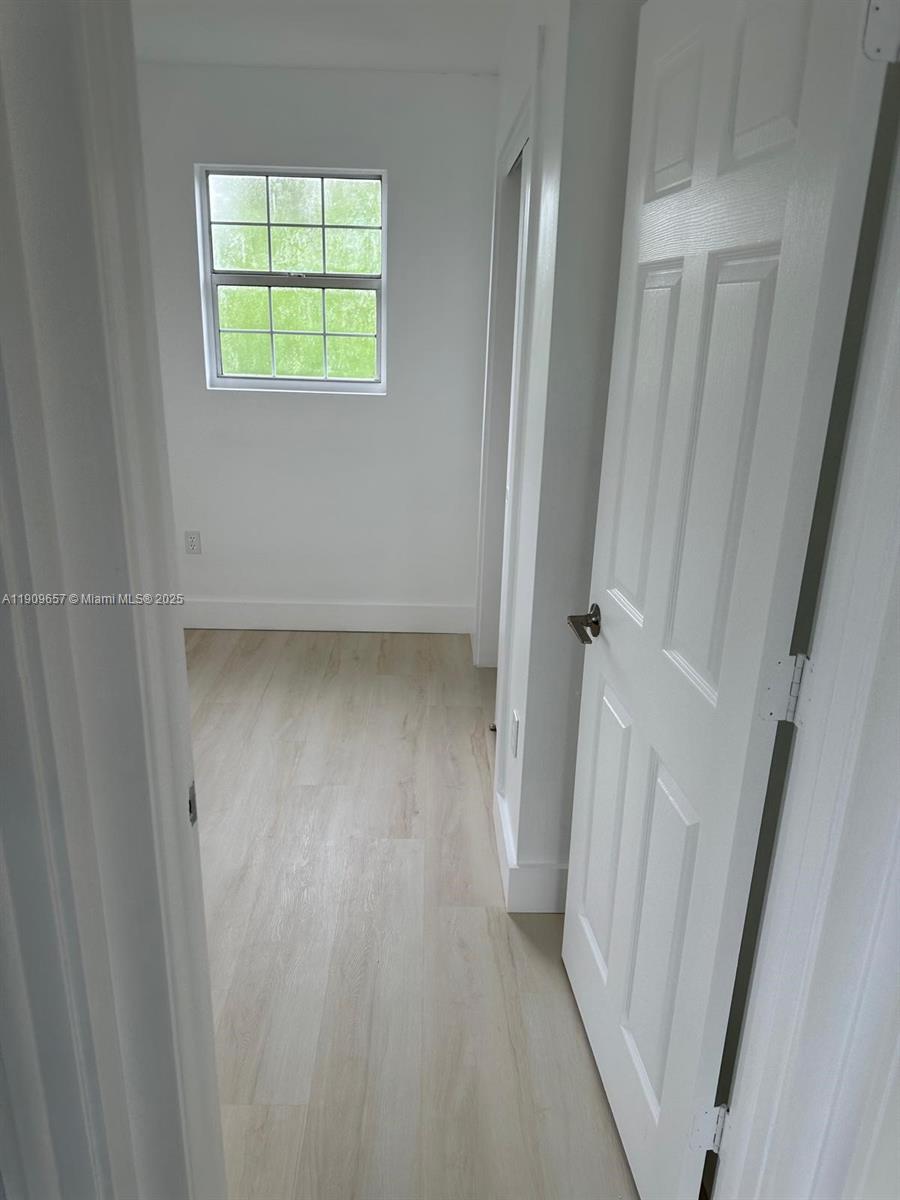 420 Burning Tree Lane, Unit 420 Punta Gorda, FL 33982 - Photo 5 of 19 a view of an empty room with a window