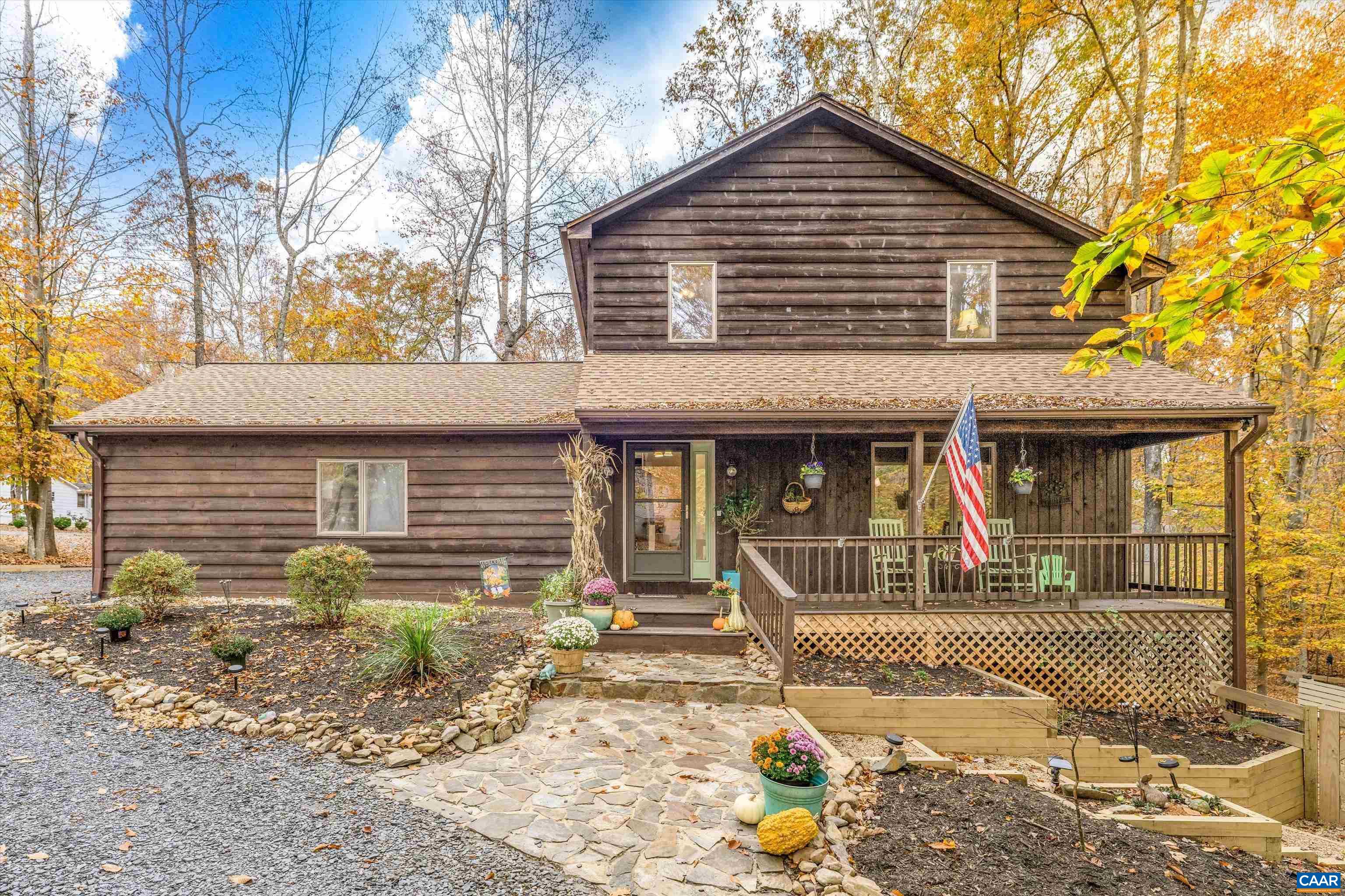 41 Dogleg Road Palmyra, VA 22963 - Photo 1 of 47 a front view of a house with garden