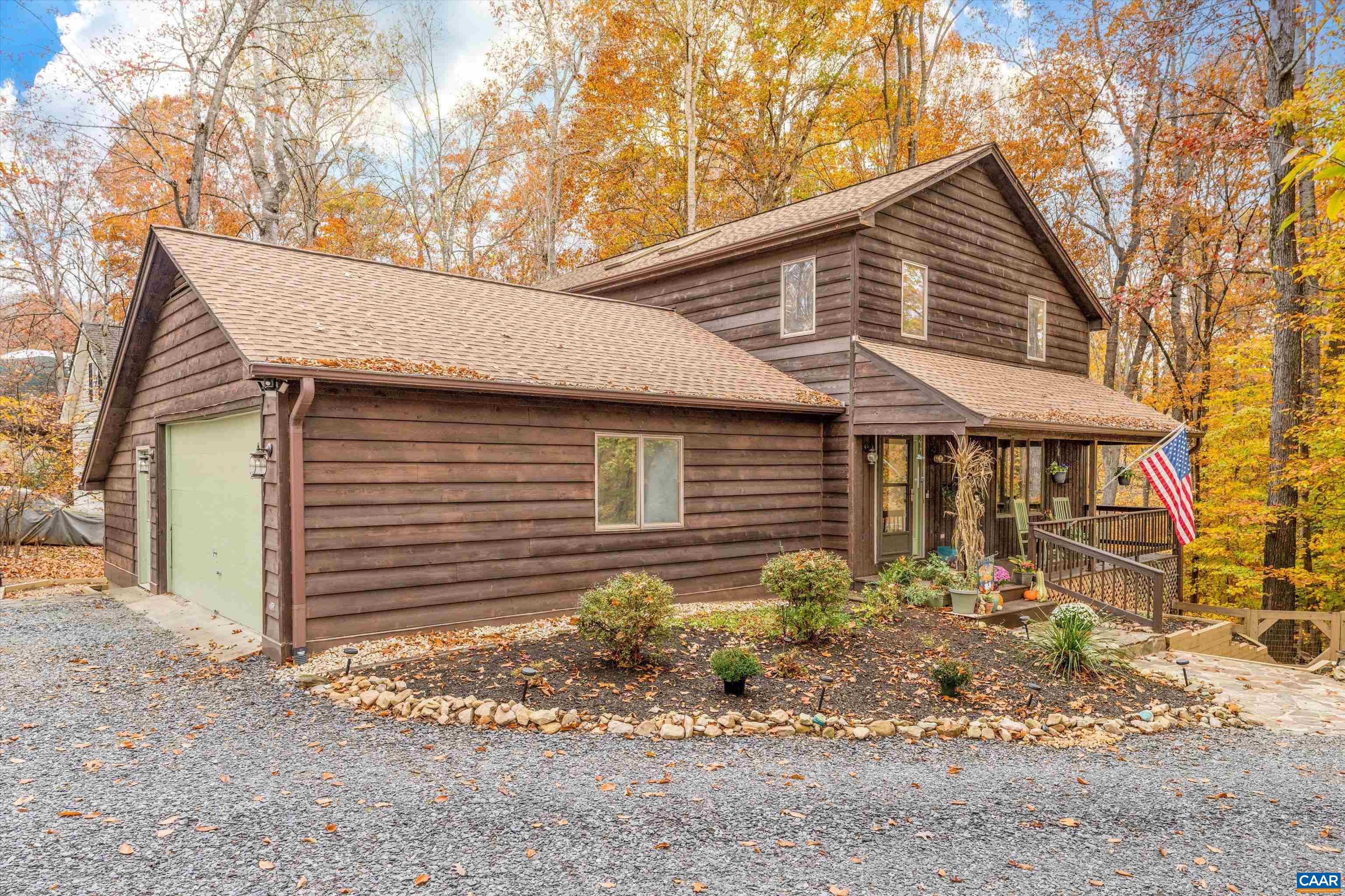 41 Dogleg Road Palmyra, VA 22963 - Photo 3 of 47 a front view of house with yard and trees around