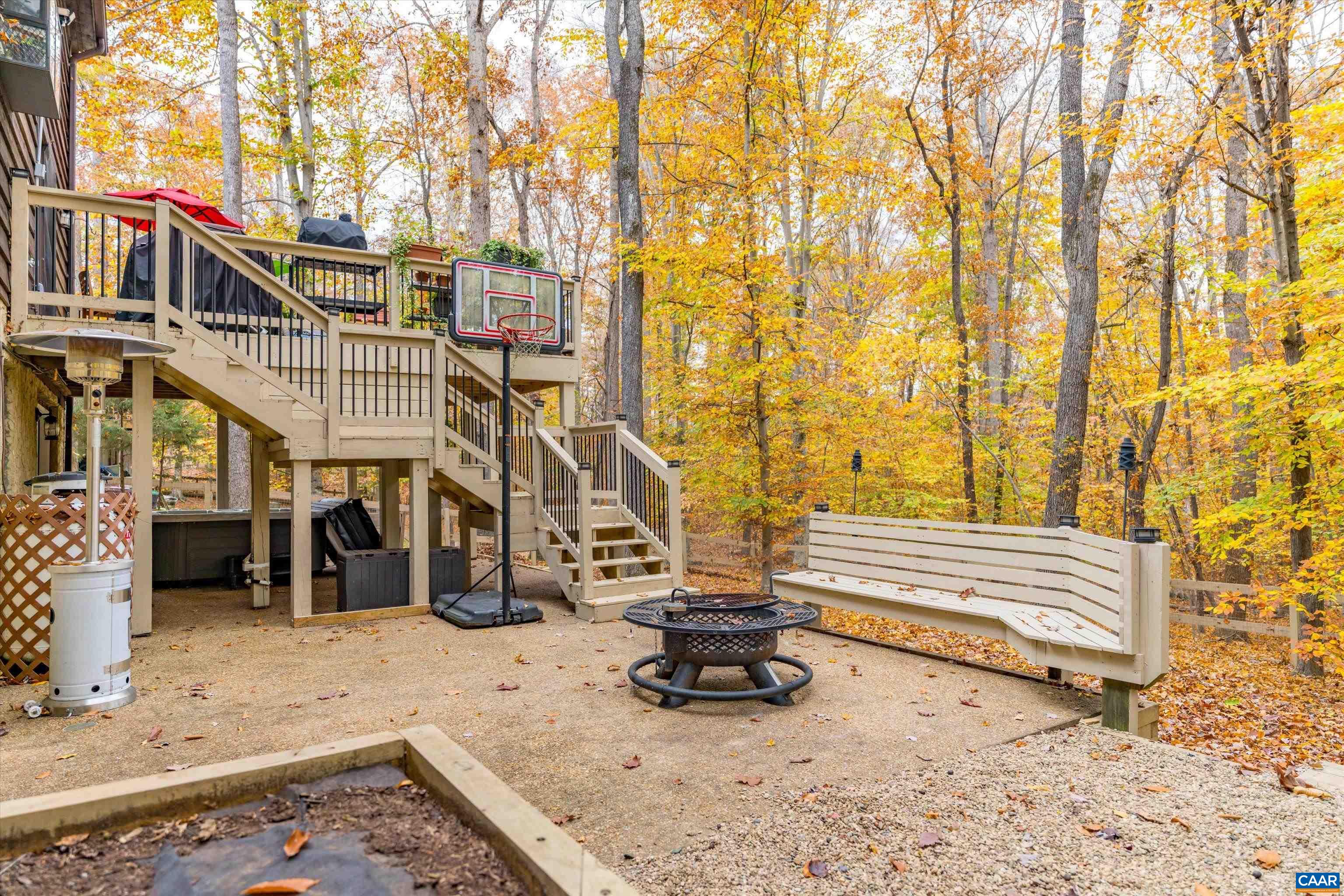 41 Dogleg Road Palmyra, VA 22963 - Photo 5 of 47 a view of a patio with a table and chairs
