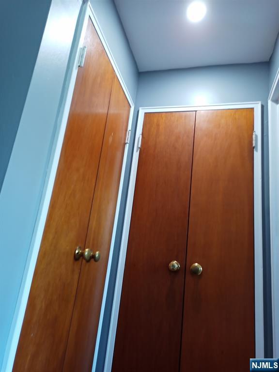 565 Grove, Unit B12 Clifton, NJ 07013 - Photo 15 of 19 an empty room with closet