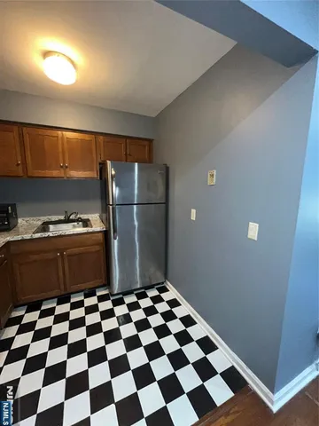 a black and white checkered floor with a black white checkered floor