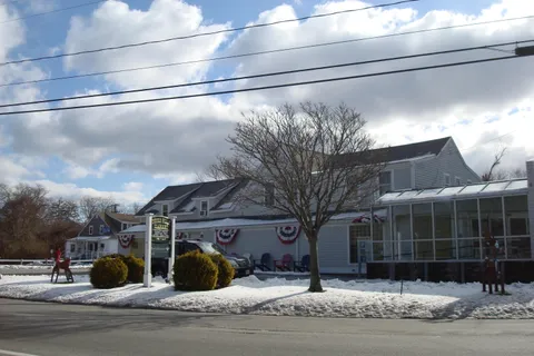 a view of a house with a street