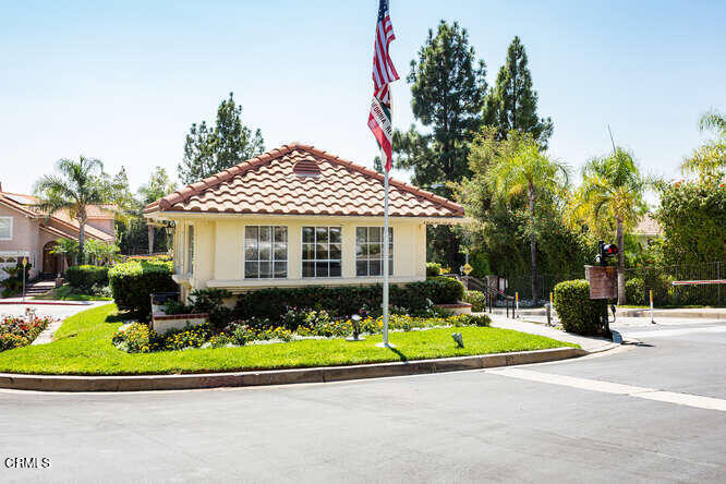19721 Turtle Springs Way Porter Ranch, CA 91326 - Photo 36 of 42 a front view of a house with a yard