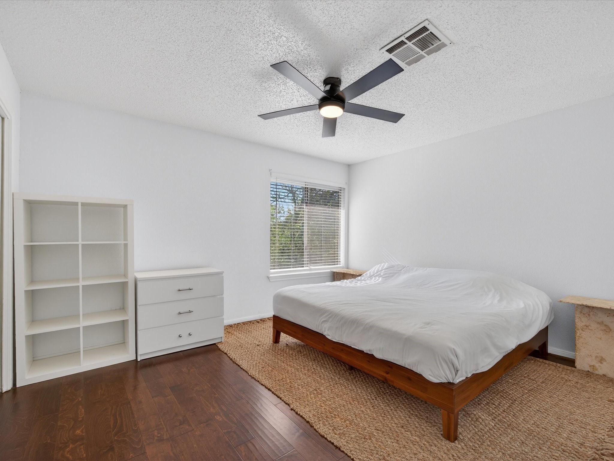 1676 Beaconshire Houston, TX 77077 - Photo 25 of 28 a bedroom with a bed and a window