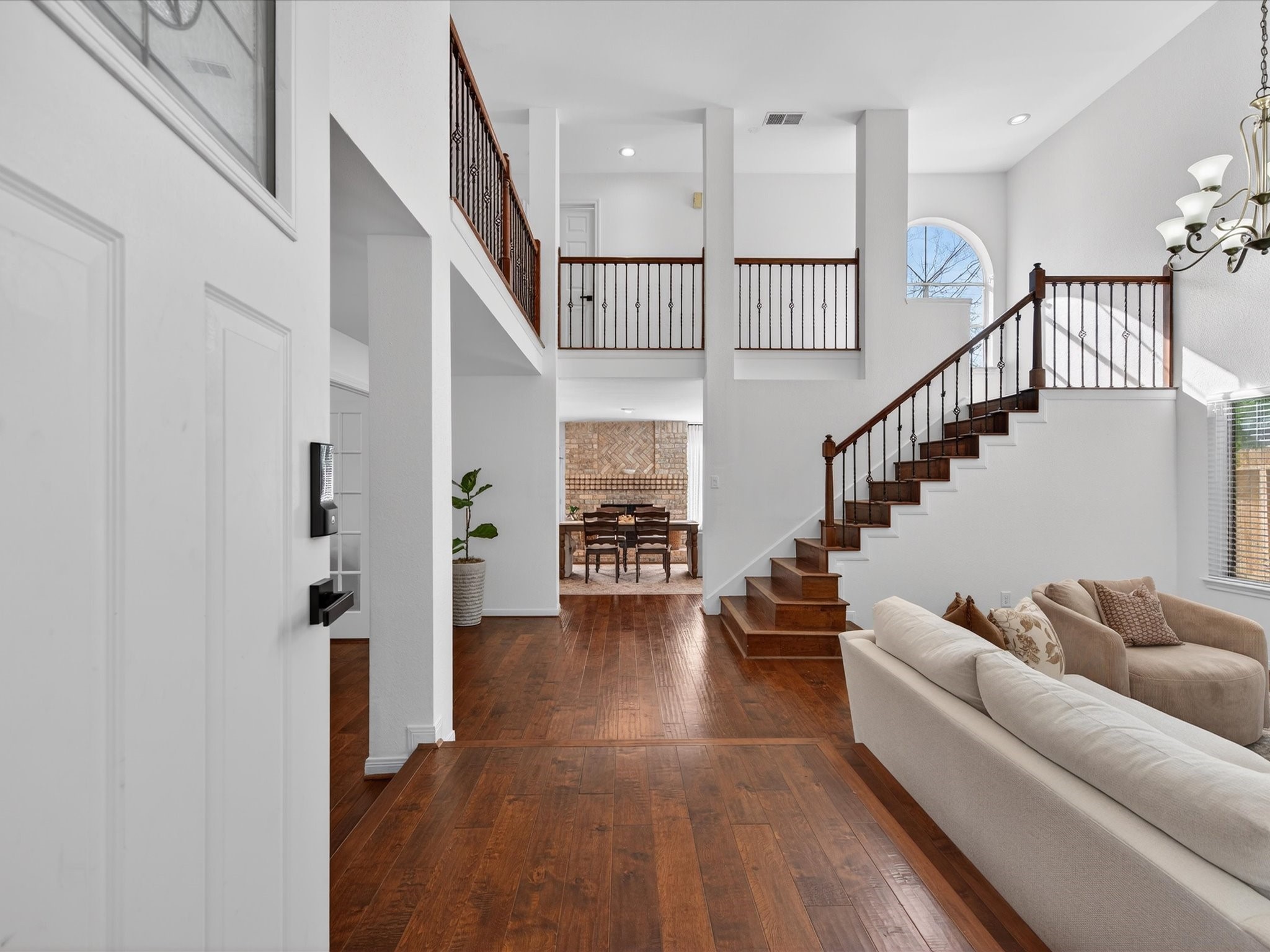 1676 Beaconshire Houston, TX 77077 - Photo 3 of 28 a view of entryway and hall with wooden floor
