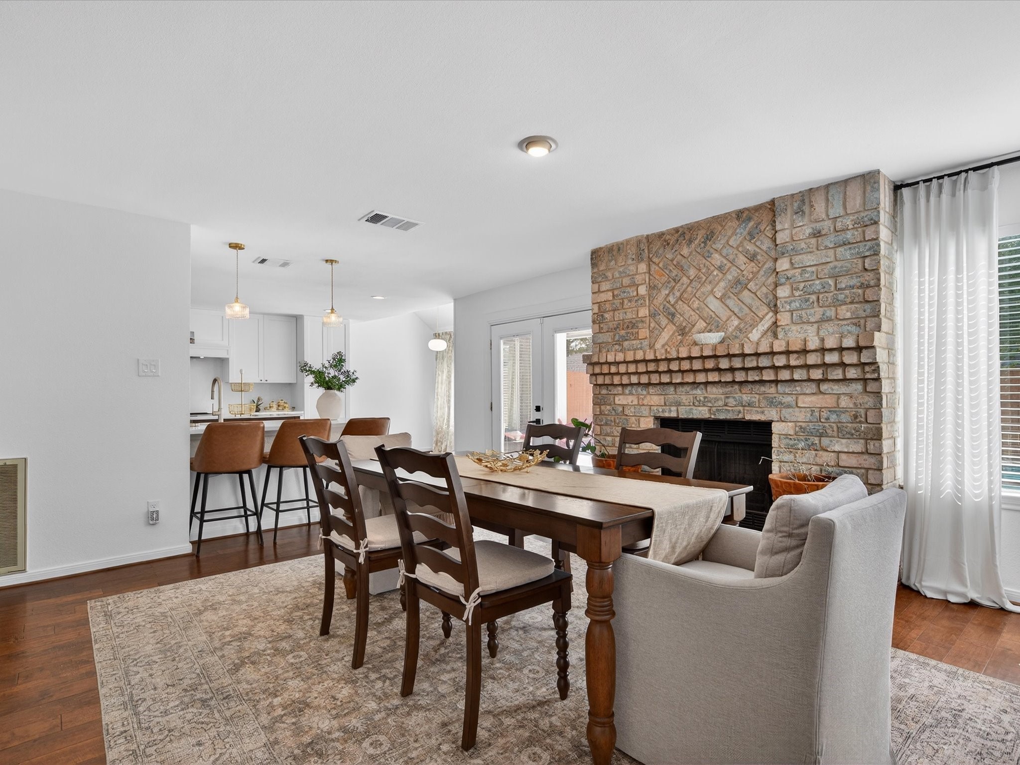 1676 Beaconshire Houston, TX 77077 - Photo 8 of 28 a living room with furniture a fireplace and a table