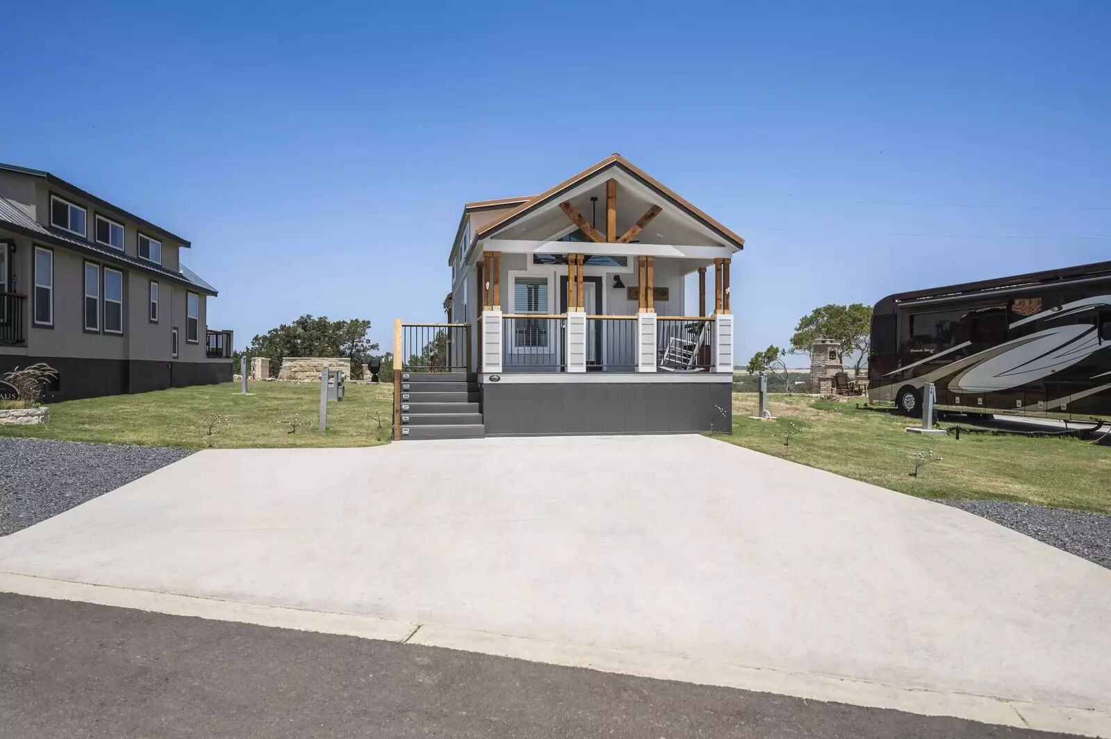 5386 Ranch Road 1376, Unit 79 Fredericksburg, TX 78624 - Photo 22 of 39 View of front facade featuring covered porch and a front lawn