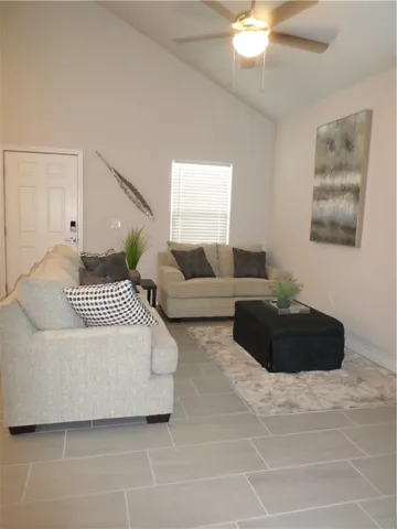 a large white bed in a white room