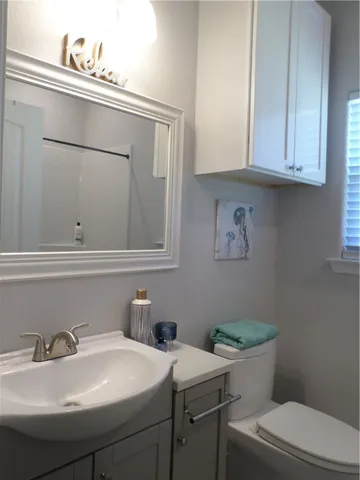 a bathroom with a sink and a toilet