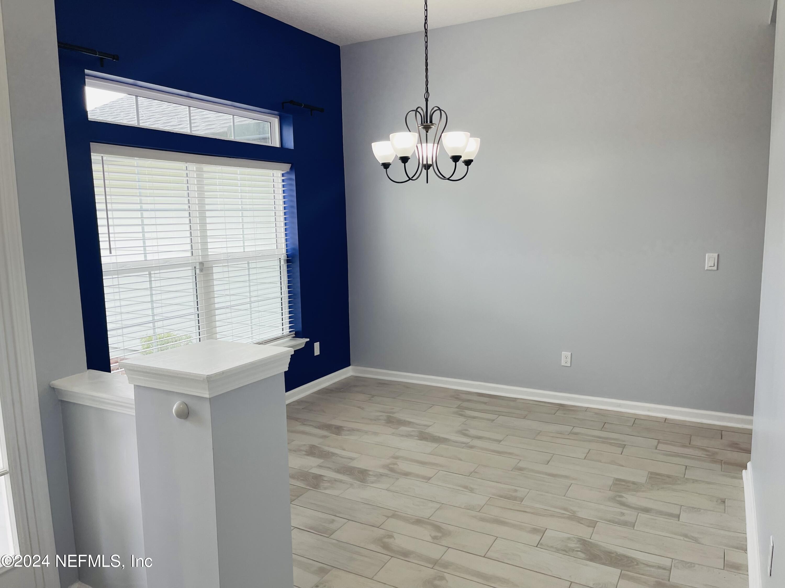 86508 Secluded Place Yulee, FL 32097 - Photo 2 of 43 a view of an empty room with a window