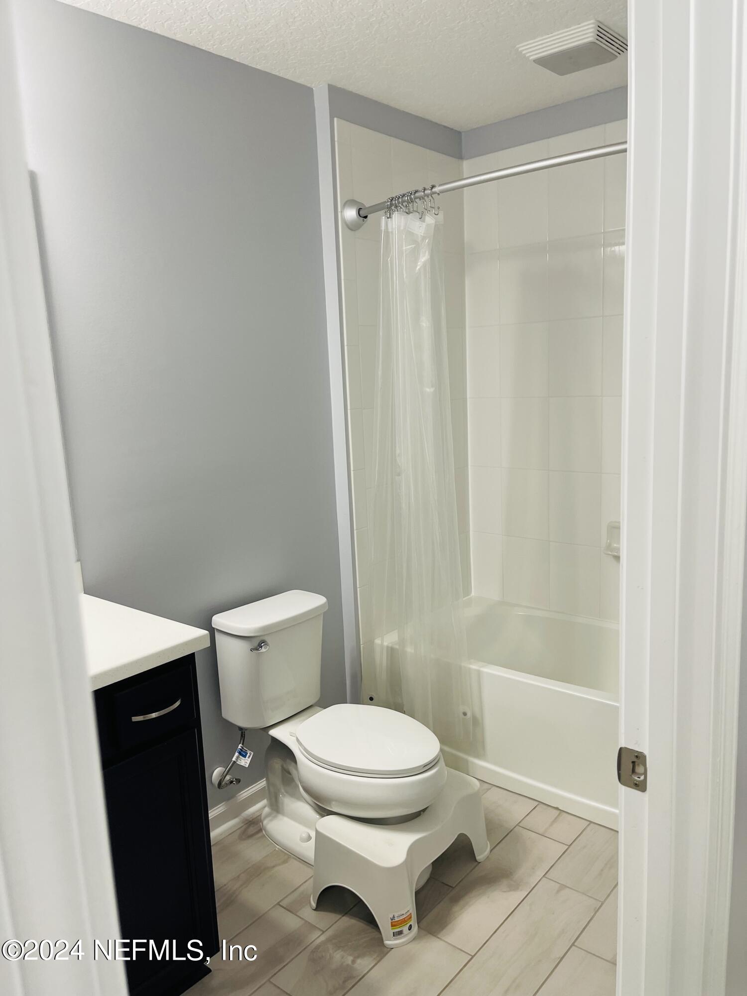 86508 Secluded Place Yulee, FL 32097 - Photo 24 of 43 a bathroom with a toilet and a shower