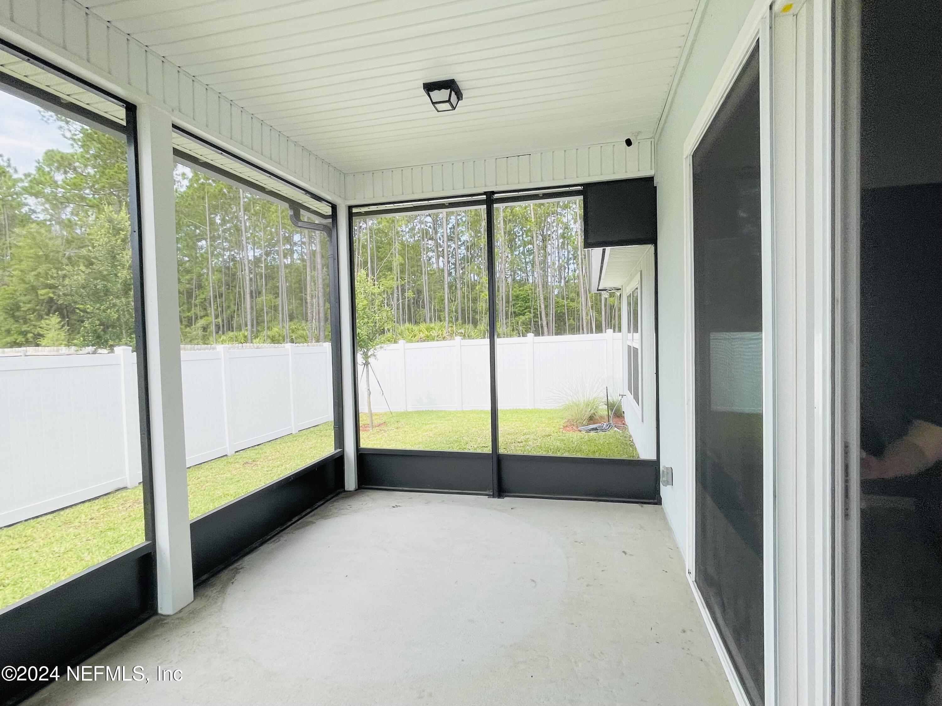 86508 Secluded Place Yulee, FL 32097 - Photo 36 of 43 a view of an empty room and window