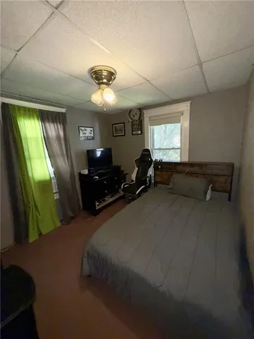 a view of livingroom with furniture wooden floor and window