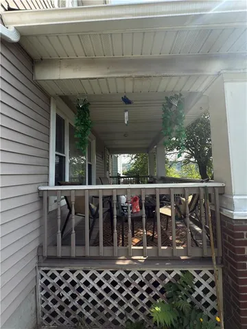 a view of room with wooden floor