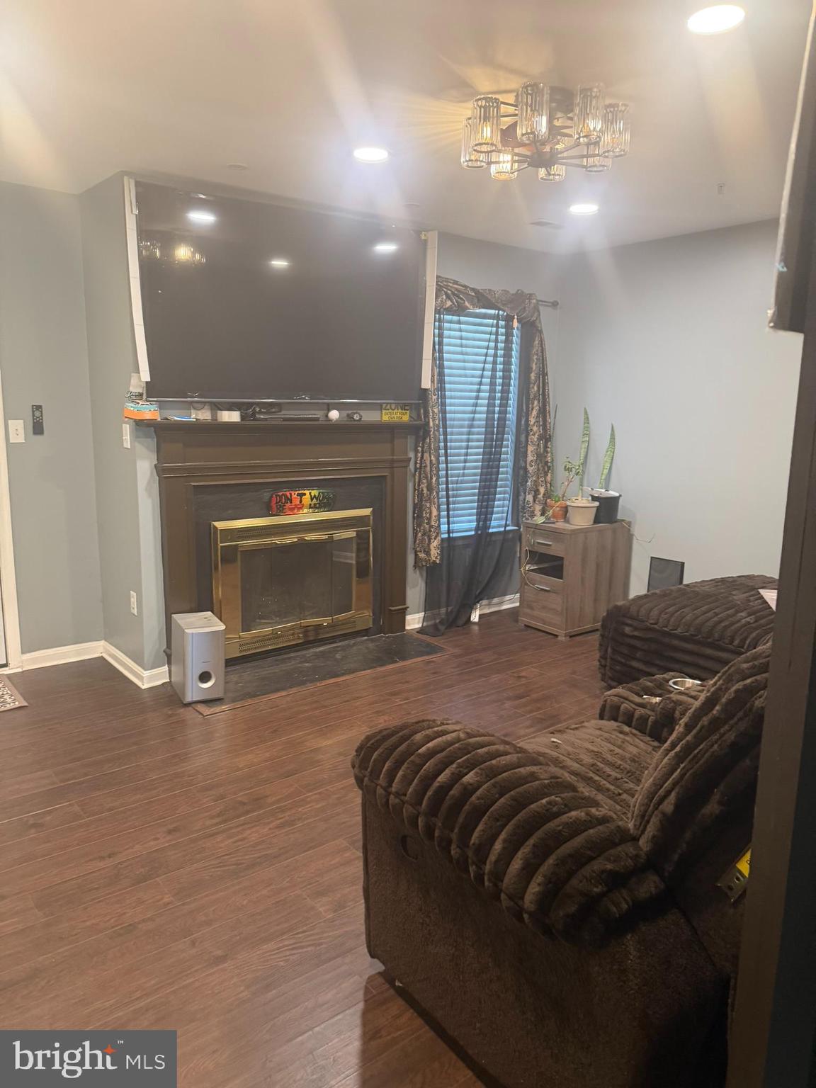 2251 Commissary Circle Odenton, MD 21113 - Photo 17 of 17 a spacious bedroom with a bed and a fireplace