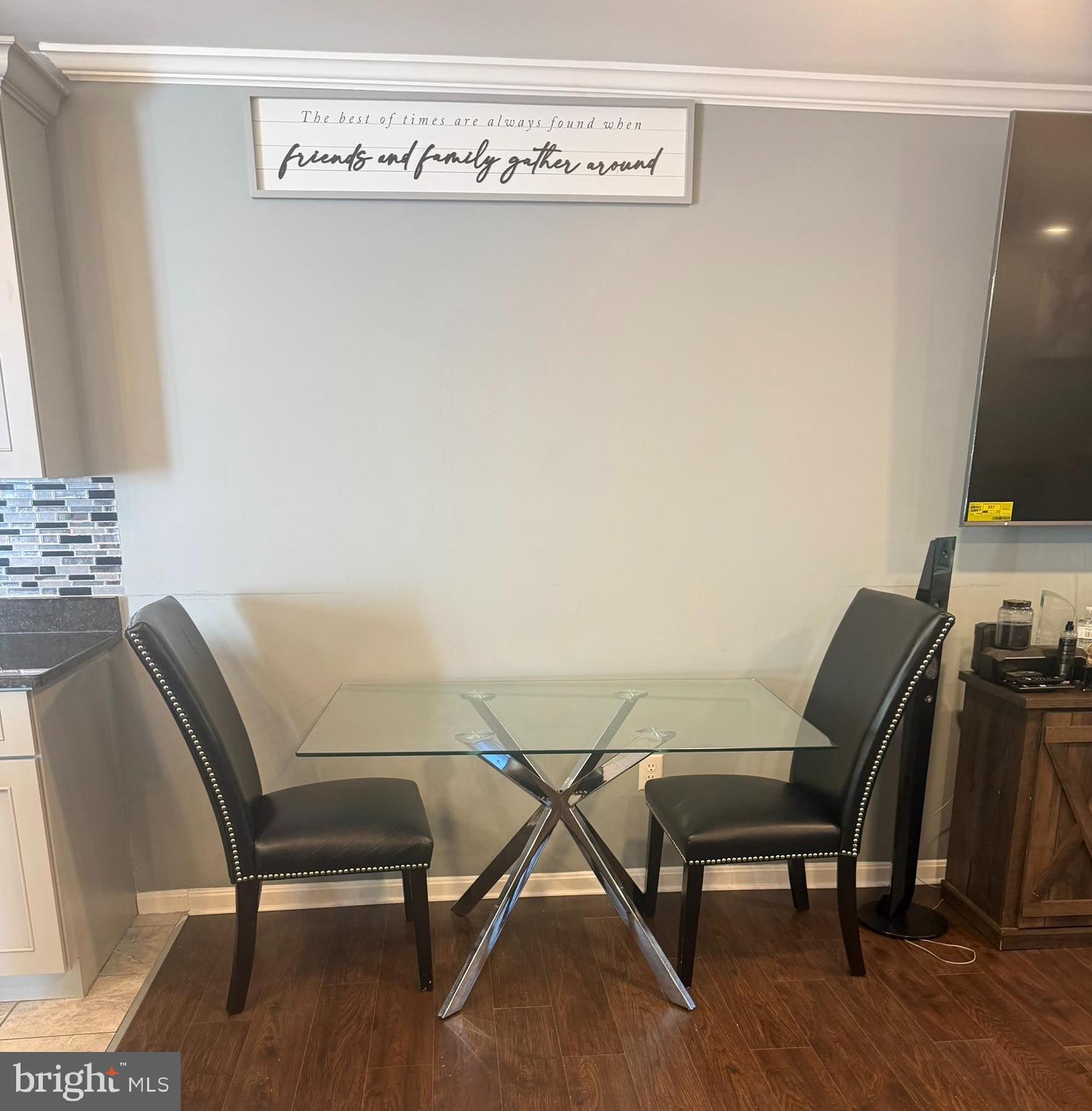 2251 Commissary Circle Odenton, MD 21113 - Photo 4 of 17 a view of a workspace with furniture and wooden floor