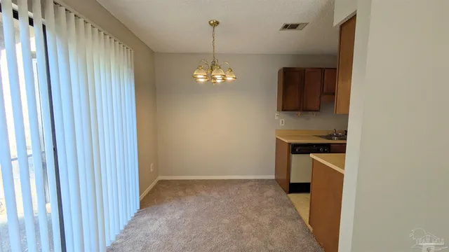 a view of a kitchen with a sink and dishwasher kitchen view