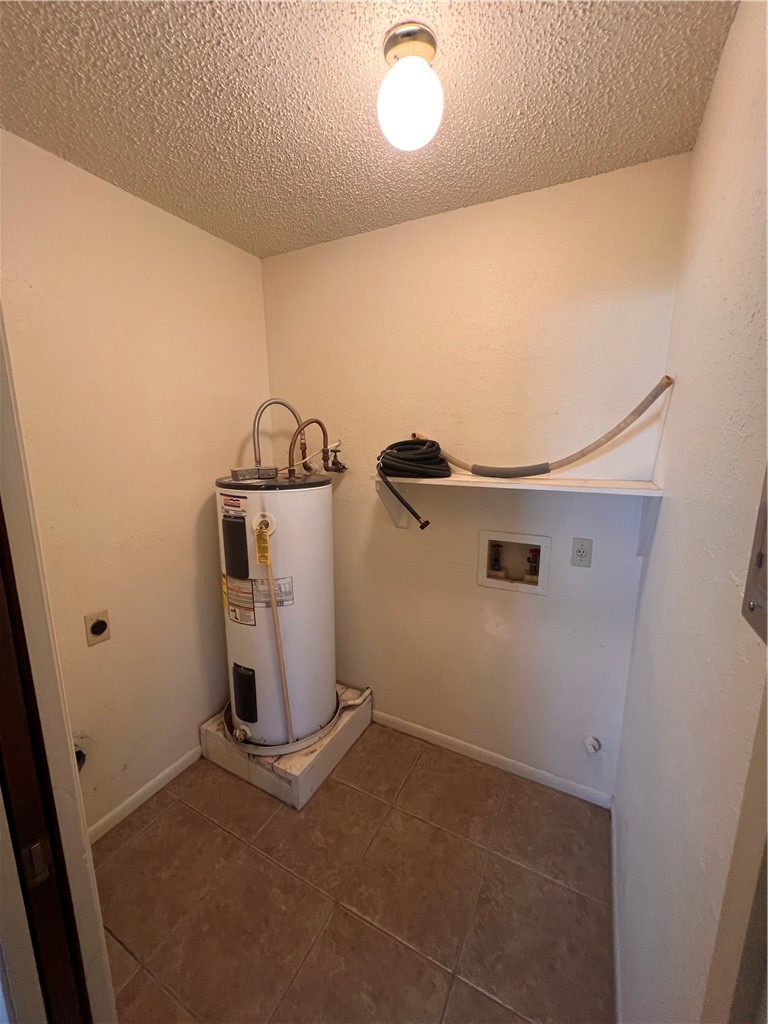 4021 Acushnet Drive, Unit F Corpus Christi, TX 78413 - Photo 19 of 21 a view of a storage & utility room with a window