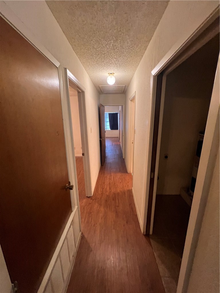 4021 Acushnet Drive, Unit F Corpus Christi, TX 78413 - Photo 2 of 21 a view of hallway with wooden floor
