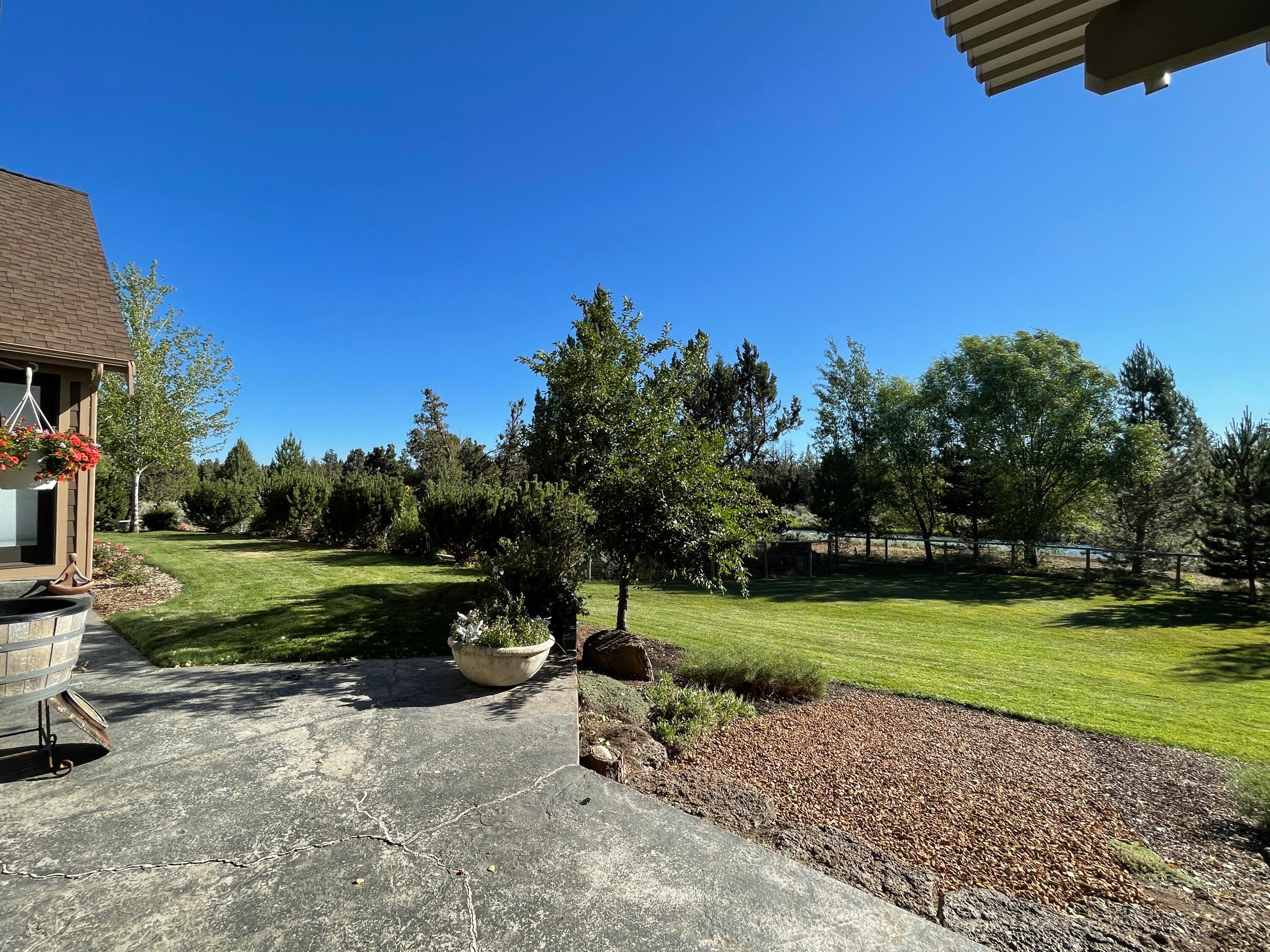 63545 Overtree Road Bend, OR 97701 - Photo 52 of 63 completely fenced multi level yard and fruit trees