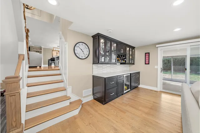 a view of a kitchen cabinets and a wooden floor