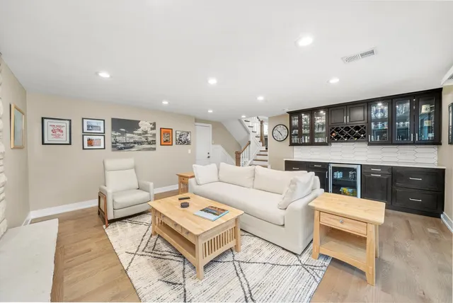 a living room with furniture and a table
