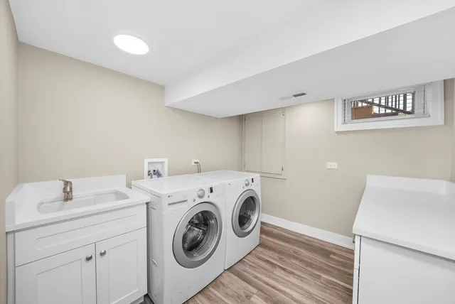 a utility room with dryer and washer