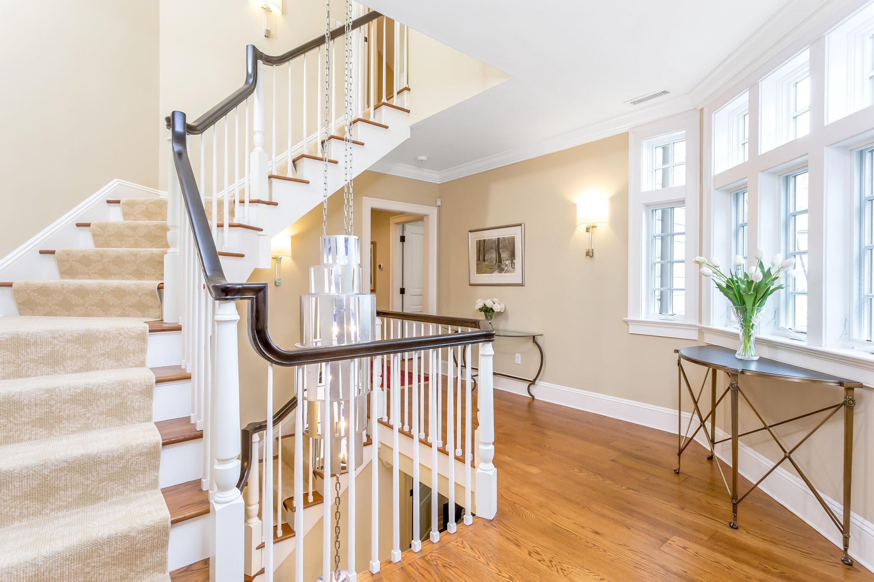 2 Harbor Bluff Lane Rowayton, CT 06853 - Photo 18 of 37 a view of entryway with wooden floor and windows