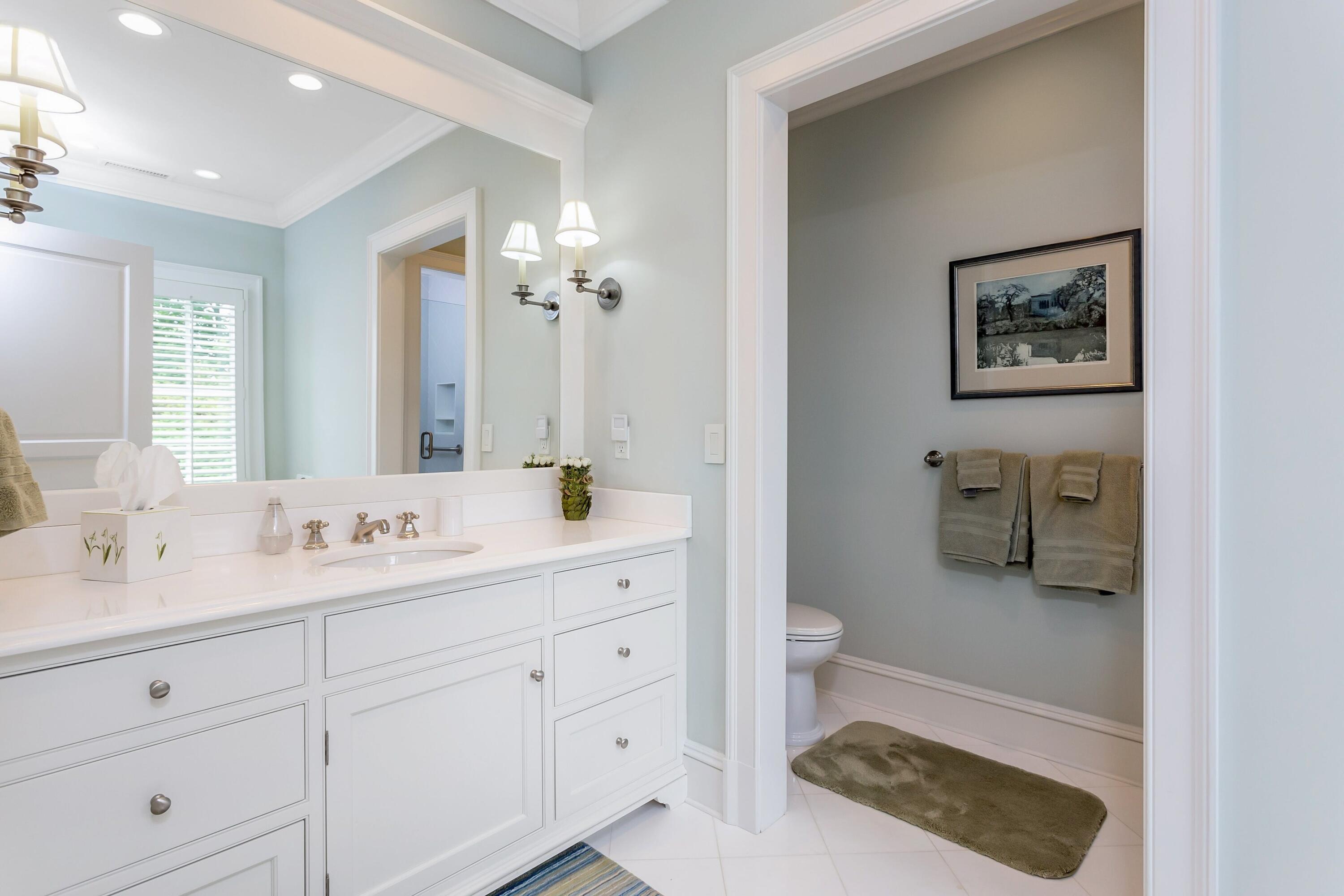 2 Harbor Bluff Lane Rowayton, CT 06853 - Photo 24 of 37 a en suite bathroom with a toilet a sink and mirror