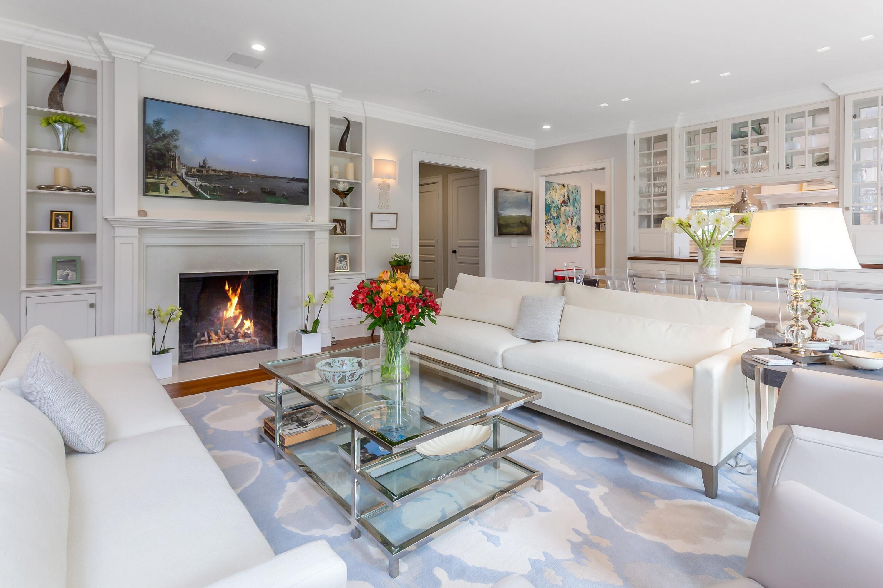 2 Harbor Bluff Lane Rowayton, CT 06853 - Photo 4 of 37 a living room with furniture a fireplace and a flat screen tv