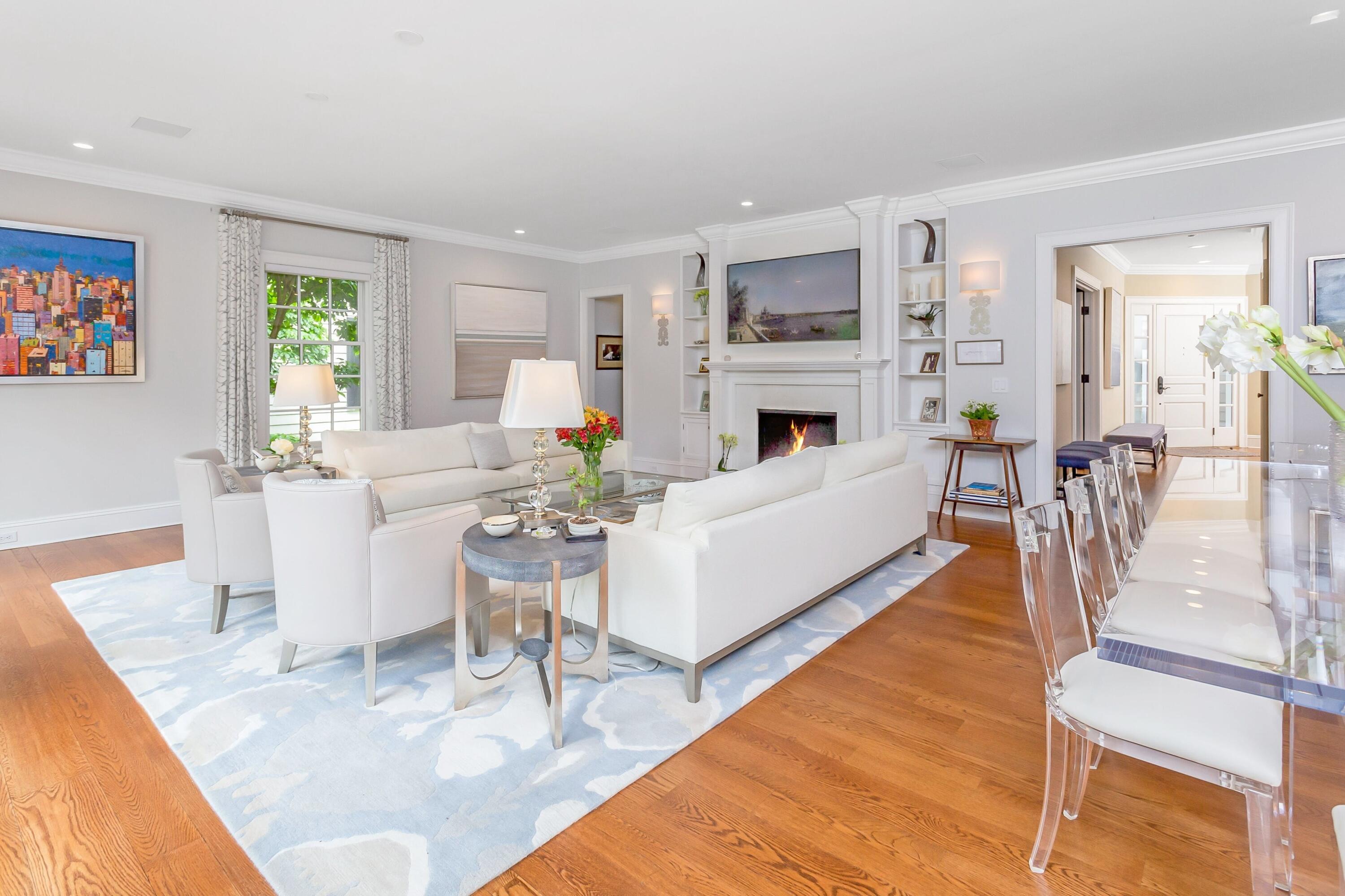 2 Harbor Bluff Lane Rowayton, CT 06853 - Photo 6 of 37 a living room with fireplace furniture and a table
