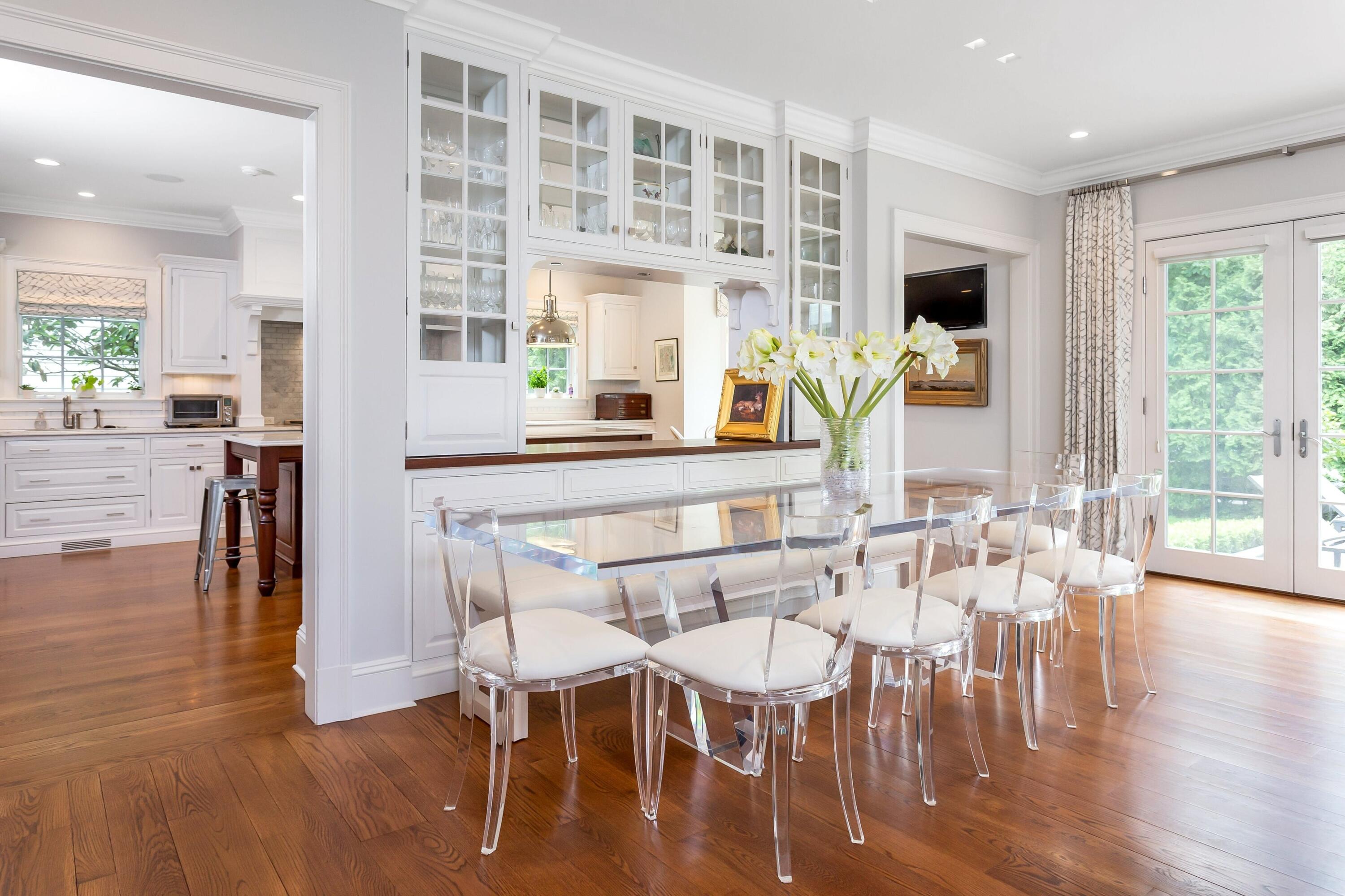 2 Harbor Bluff Lane Rowayton, CT 06853 - Photo 7 of 37 a view of a dining room with furniture window and wooden floor