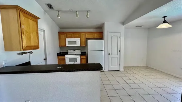 $2,000 | 1308 Zureiq Court, Clermont, FL 34714