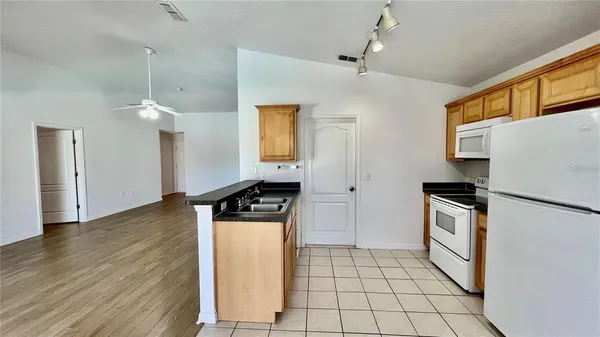 $2,000 | 1308 Zureiq Court, Clermont, FL 34714