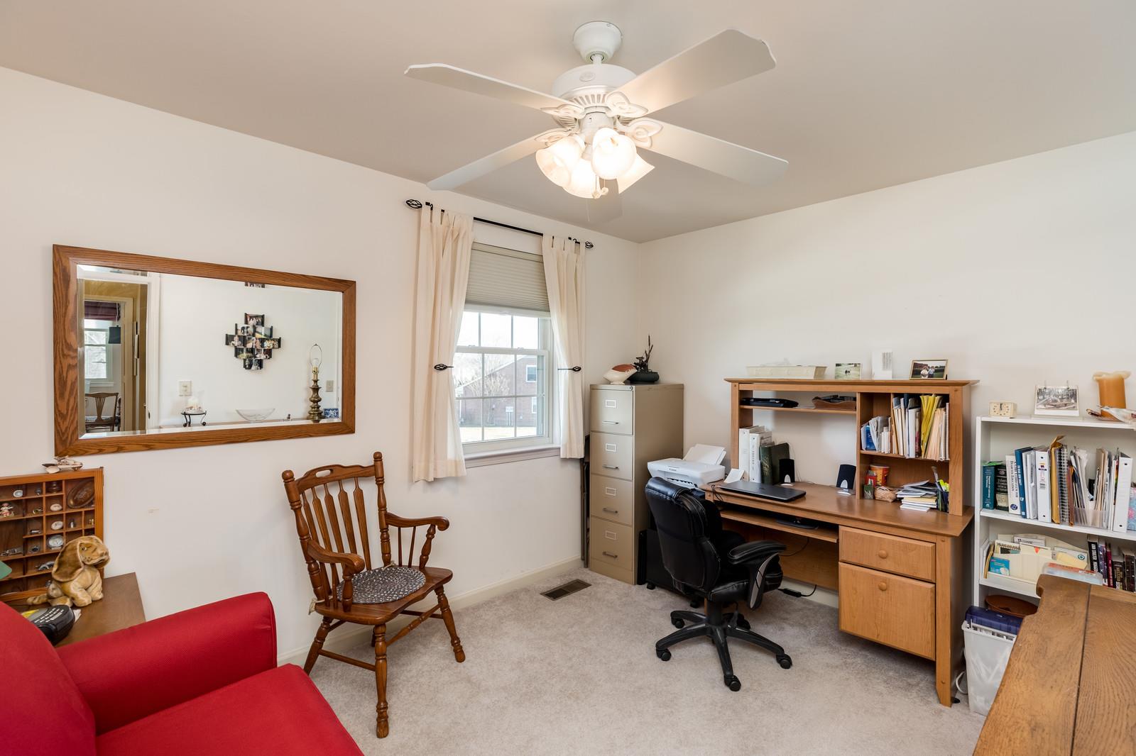1306 General George Patton Road, Unit 1306 Nashville, TN 37221 - Photo 19 of 21 a view of a workspace with furniture and a window