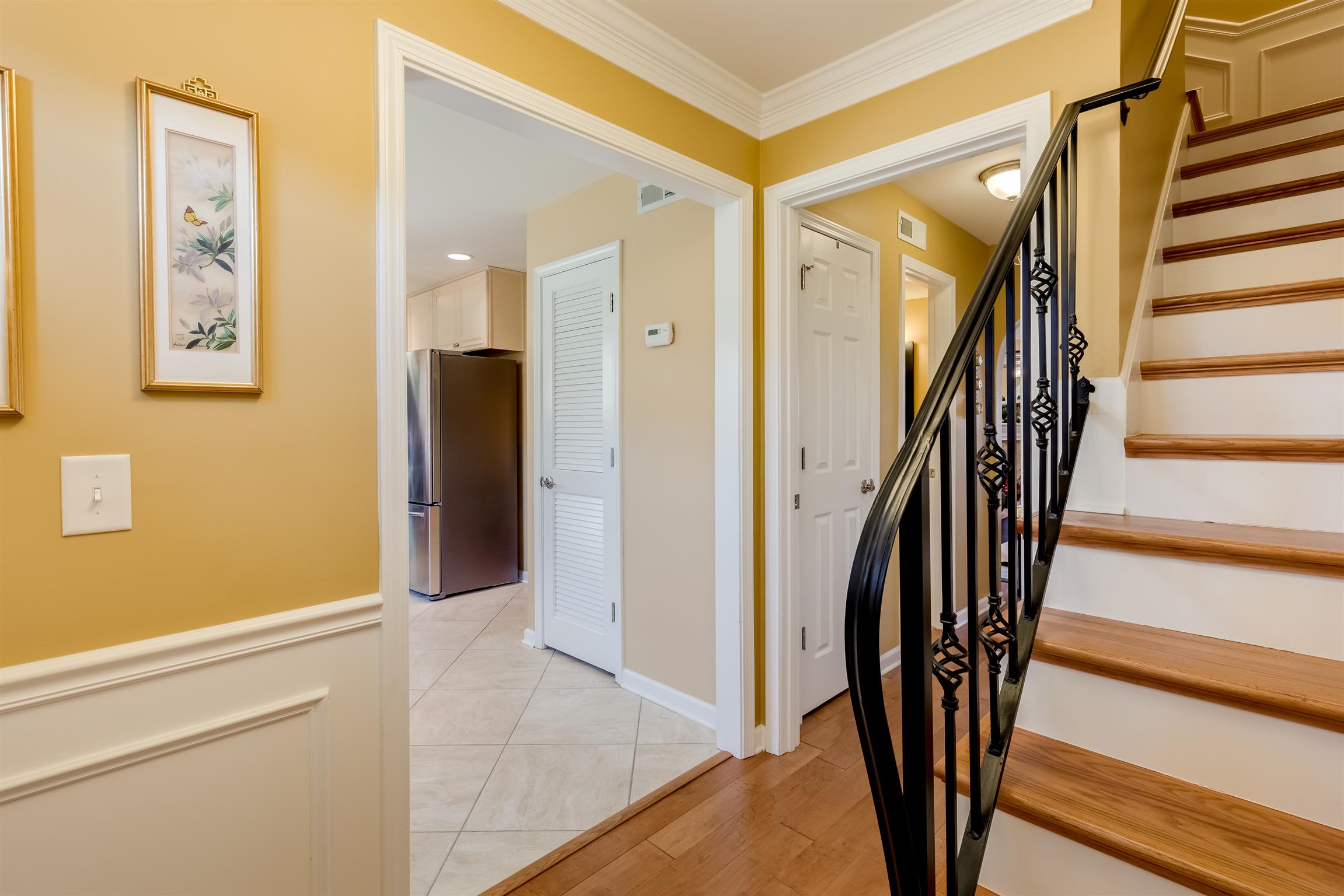 1306 General George Patton Road, Unit 1306 Nashville, TN 37221 - Photo 2 of 21 a view of a hallway with wooden floor and entryway
