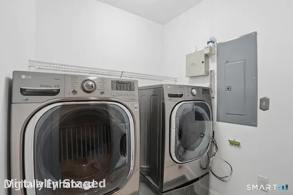 a utility room with dryer and washer
