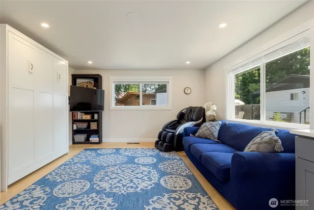 a living room with furniture and a window