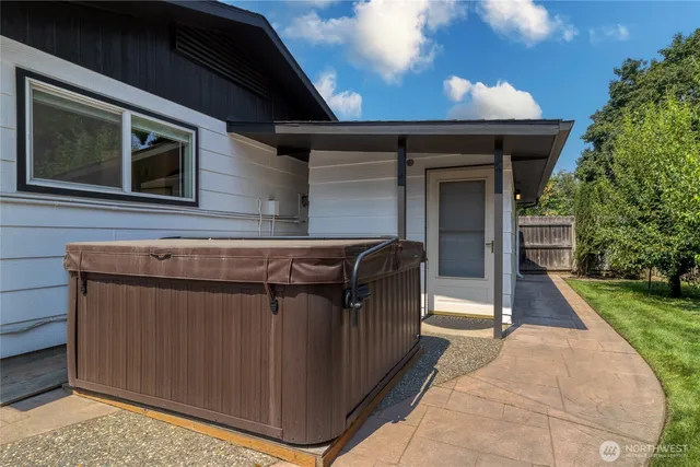 an aerial view of house with yard