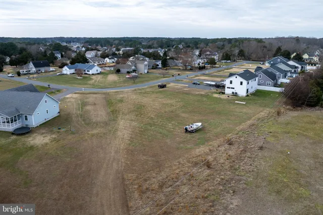 a view of a town with lawn chairs